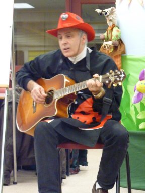 Victor Pavlov performing on guitar Mr.Cricket song - Book reading session